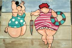 dikke dames op het strand